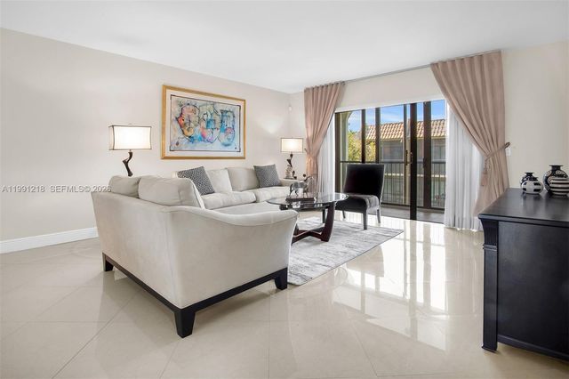 304 Racquet Club Rd 203, Weston, FL 33326