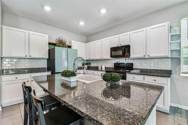 1869 HOVENWEEP ROAD, Wesley Chapel, FL 33543