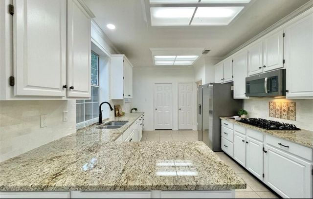 8 Greentwig Place, The Woodlands, TX 77381