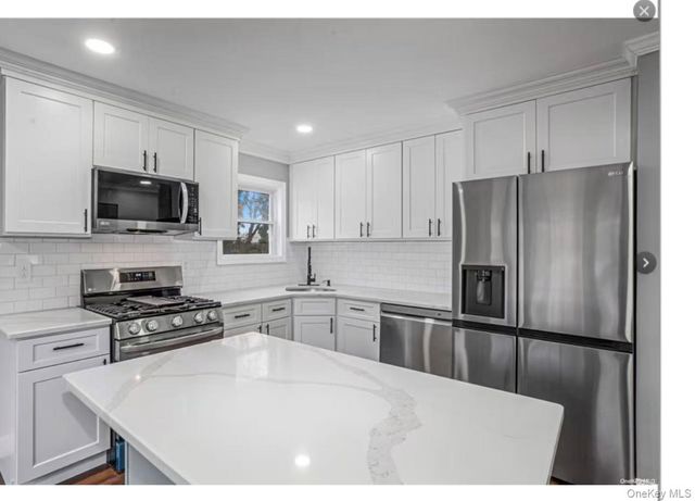 92 Ruland Road, Selden, NY 11784