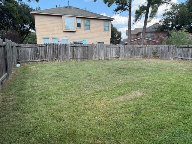11922 Lois Lane Drive, Pinehurst, TX 77362