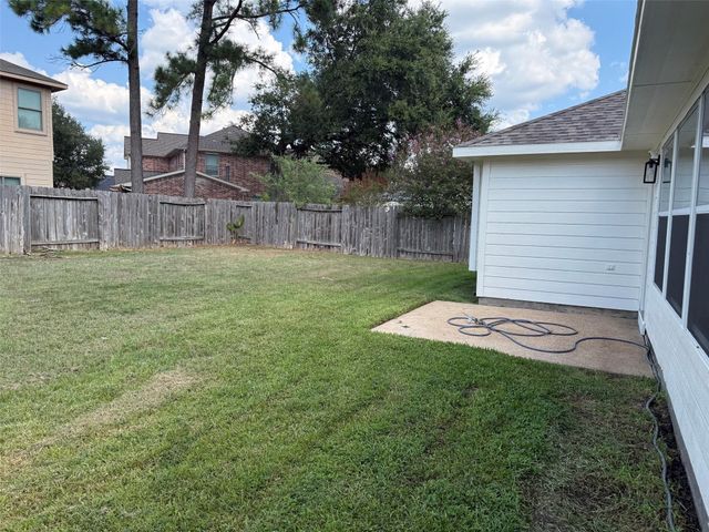 11922 Lois Lane Drive, Pinehurst, TX 77362
