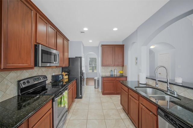 21822 Winsome Rose Court, Cypress, TX 77433