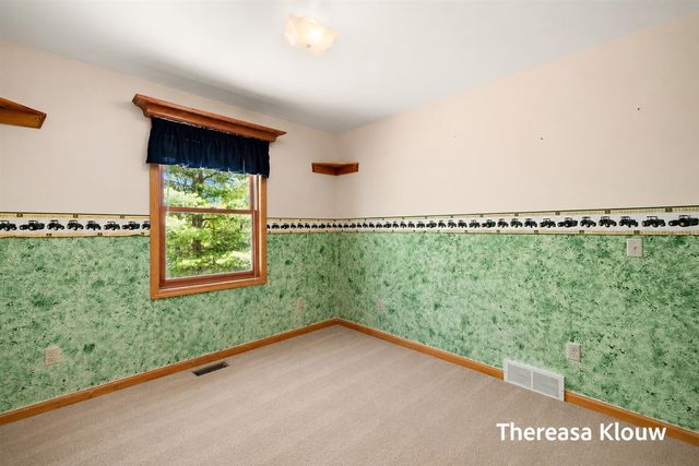 6969 E Pontaluna Road, Fruitport, MI 49415
