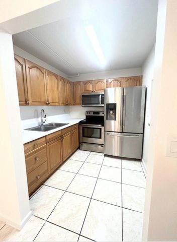 600 Village Green Court C-110, Palm Springs, FL 33461