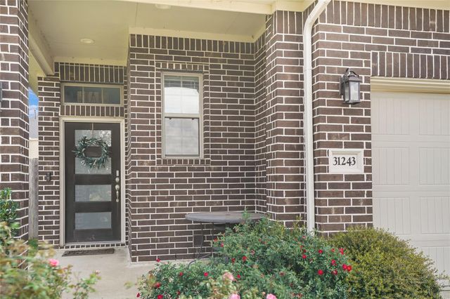 31243 Pinebrook Falls Lane, Hockley, TX 77447