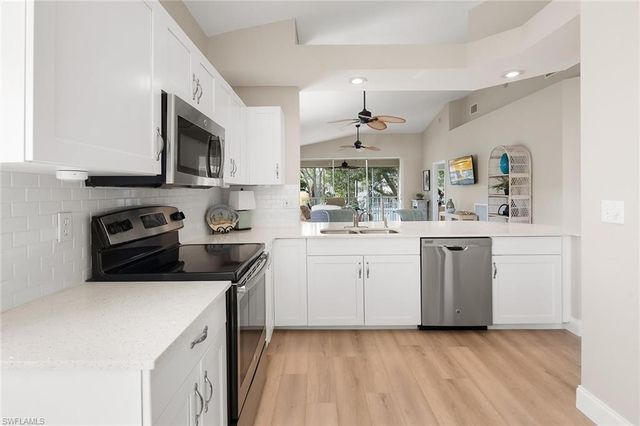 675 Wiggins Lake DR # 201, Naples, FL 34110