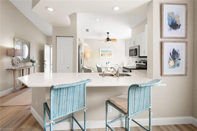 675 Wiggins Lake DR # 201, Naples, FL 34110