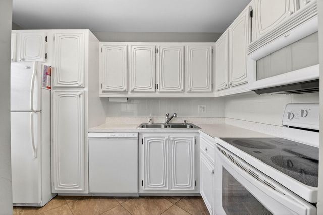 18 Colonial Club Drive 203, Boynton Beach, FL 33435