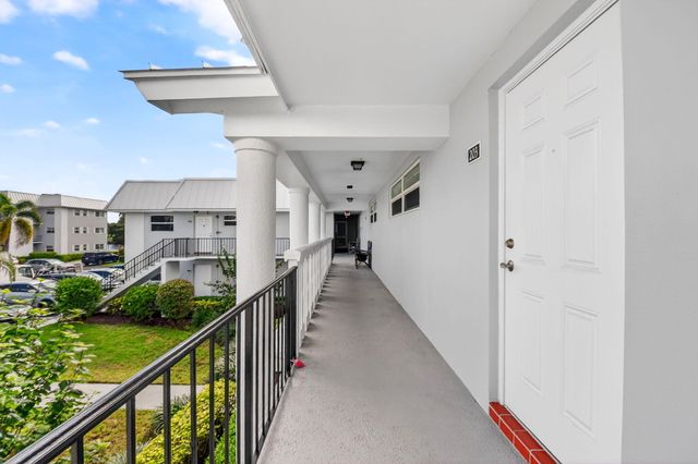 18 Colonial Club Drive 203, Boynton Beach, FL 33435