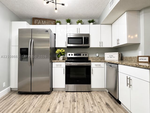 8955 Wiles Rd 204, Coral Springs, FL 33067