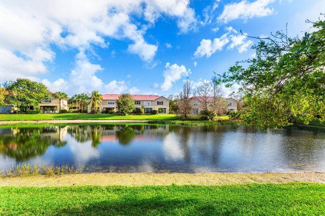 1094 Pinewood Lake Court, Greenacres, FL 33415