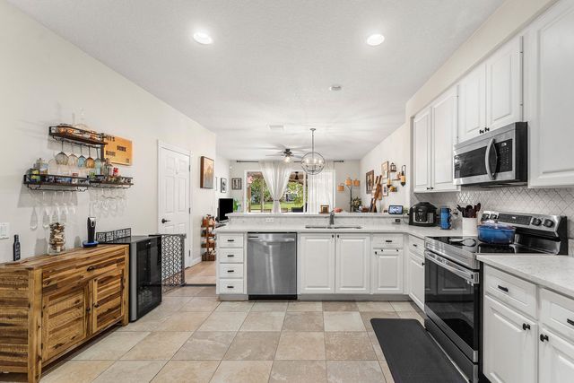 1094 Pinewood Lake Court, Greenacres, FL 33415