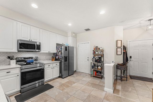 1094 Pinewood Lake Court, Greenacres, FL 33415