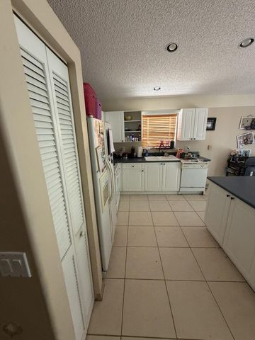 8164 PELICAN HARBOUR Drive, Lake Worth, FL 33467