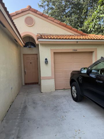 8164 PELICAN HARBOUR Drive, Lake Worth, FL 33467