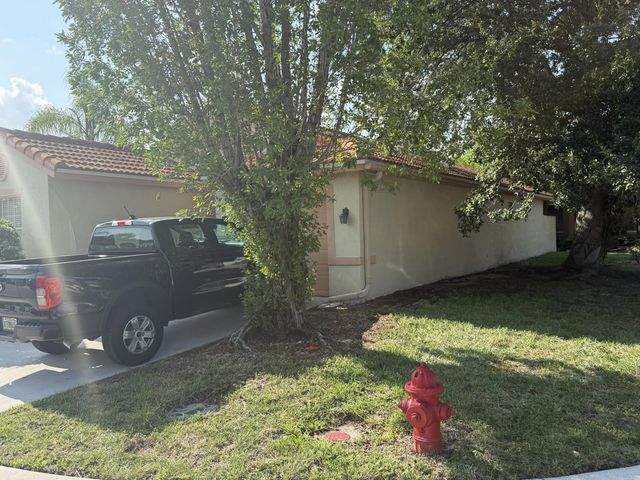 8164 PELICAN HARBOUR Drive, Lake Worth, FL 33467