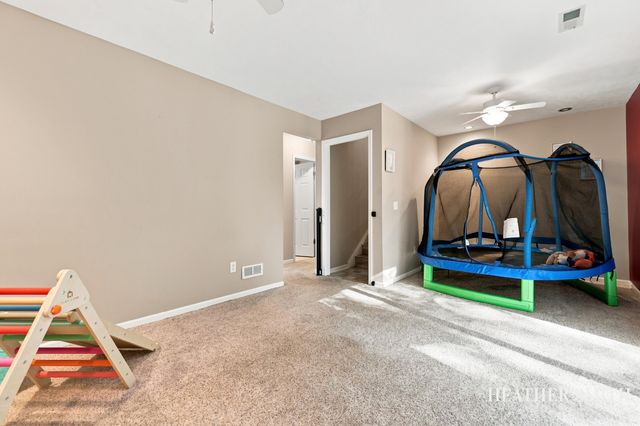 5764 Grand Oaks Drive Ne, Plainfield Twp, MI 49321