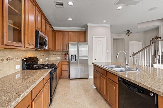30322 Deleon Fields Drive, Spring, TX 77386