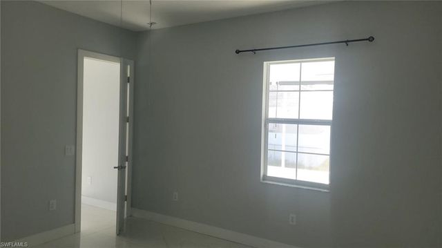 653 Foxchase DR, Lehigh Acres, FL 33974