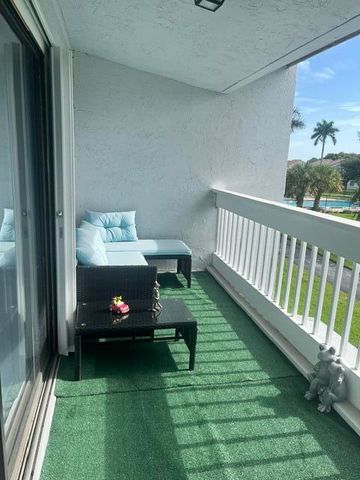 1701 WOODBRIDGE LAKES Circle, West Palm Beach, FL 33406