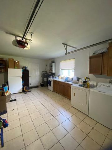 1701 WOODBRIDGE LAKES Circle, West Palm Beach, FL 33406