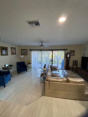 1701 WOODBRIDGE LAKES Circle, West Palm Beach, FL 33406