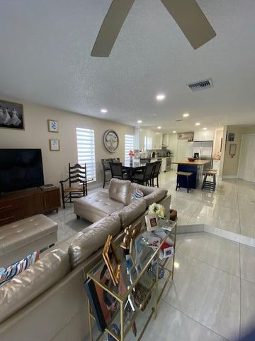 1701 WOODBRIDGE LAKES Circle, West Palm Beach, FL 33406