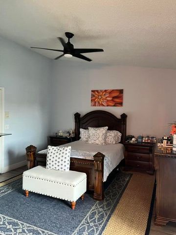 1701 WOODBRIDGE LAKES Circle, West Palm Beach, FL 33406