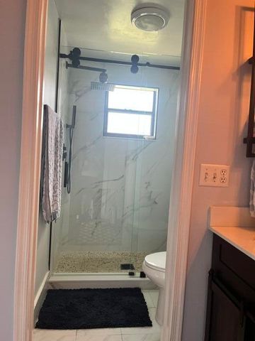 1701 WOODBRIDGE LAKES Circle, West Palm Beach, FL 33406