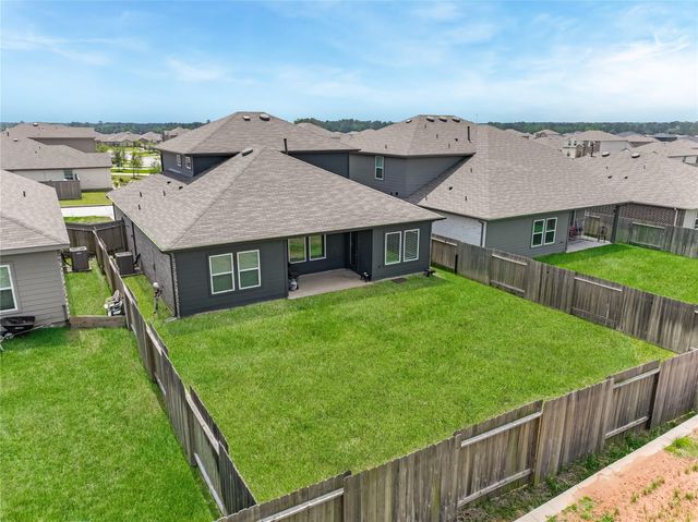 15022 High Rapids Lane, Magnolia, TX 77354