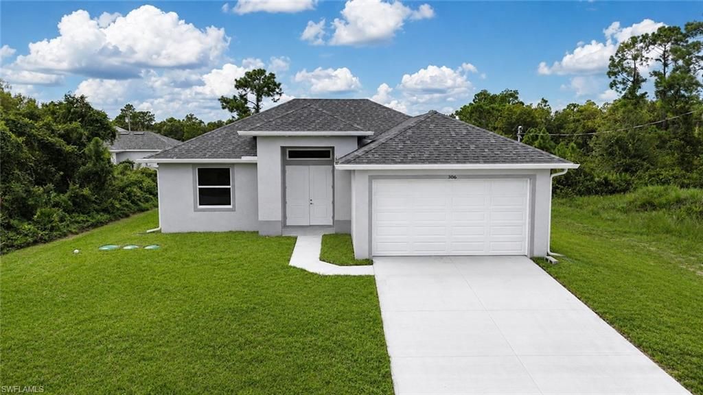306 Lenz AVE S, LEHIGH ACRES, FL 33974 — exterior