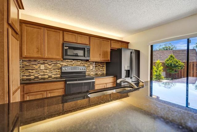 973 Springdale Circle 97-C, Palm Springs, FL 33461