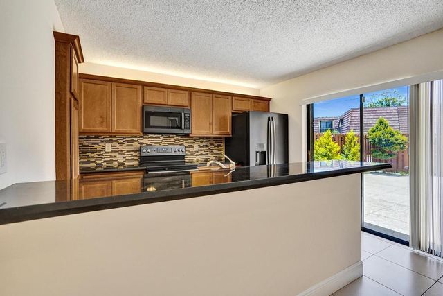 973 Springdale Circle 97-C, Palm Springs, FL 33461