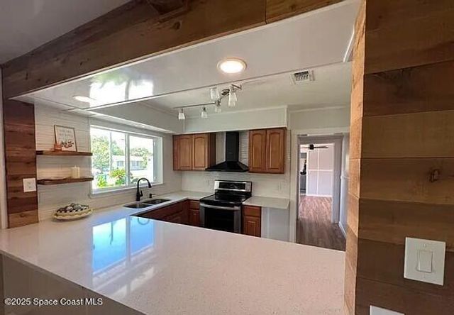 450 Riverdale Drive, Merritt Island, FL 32953