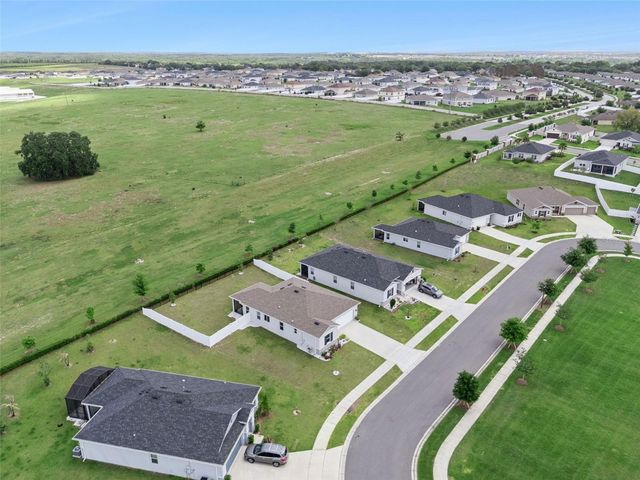 1682 LITTLELEAF BOXWOOD LOOP, Mascotte, FL 34753