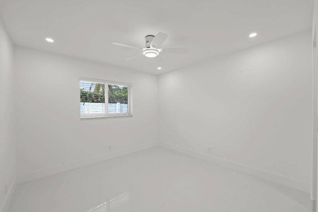 Image 60 of property listing at 979 NW 8th Street, Boca Raton, FL 33486