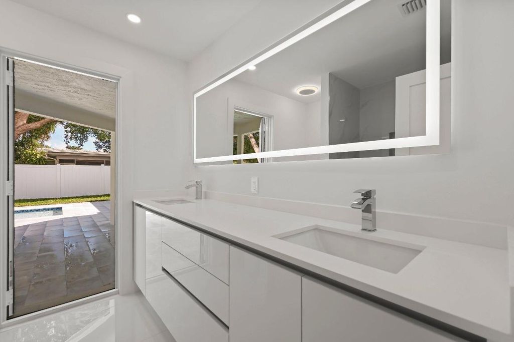 Image 63 of property listing at 979 NW 8th Street, Boca Raton, FL 33486