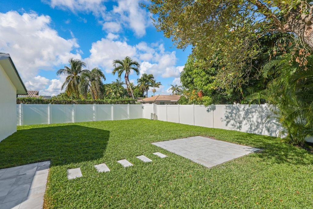 Image 87 of property listing at 979 NW 8th Street, Boca Raton, FL 33486