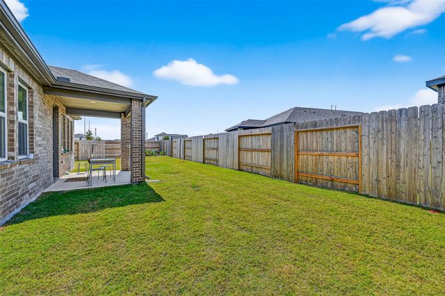 9703 Arrigoni Creek Drive, Cypress, TX 77433