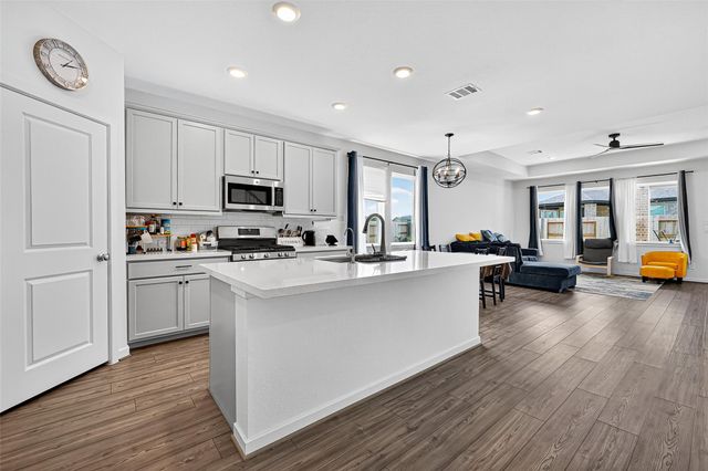 9703 Arrigoni Creek Drive, Cypress, TX 77433