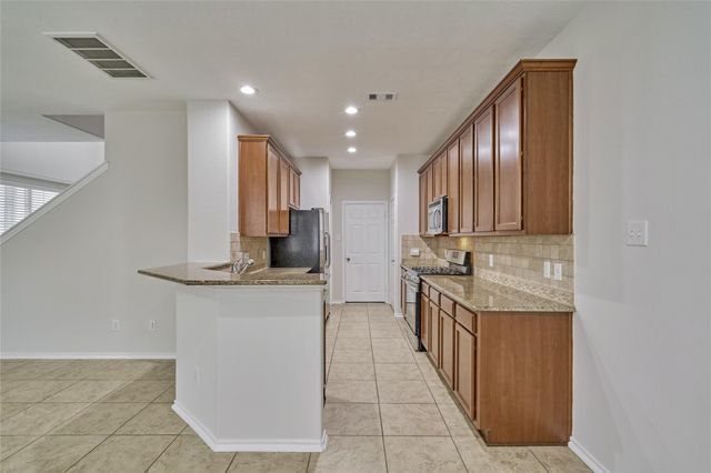 26 Bowerbank Court, Magnolia, TX 77354