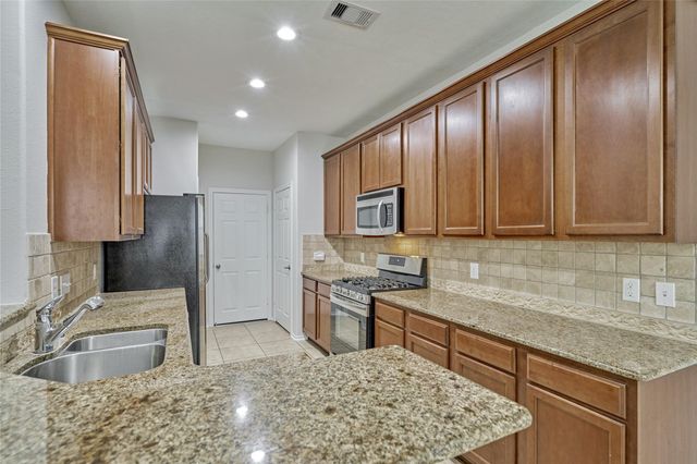 26 Bowerbank Court, Magnolia, TX 77354