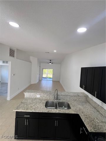 1414 W 12th ST, Lehigh Acres, FL 33972