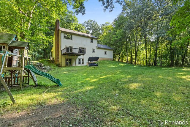 99 Radny Drive Se, Vergennes Twp, MI 49331