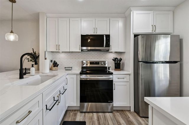 9032 MISSION OAKS BOULEVARD F, Seminole, FL 33776