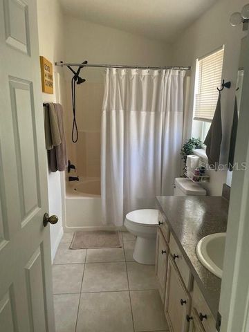 1048 WINDING WATER WAY, Clermont, FL 34714