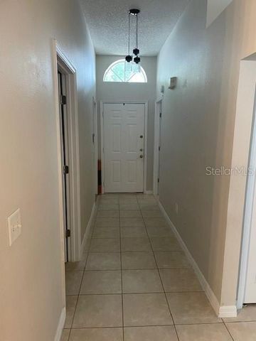 1048 WINDING WATER WAY, Clermont, FL 34714