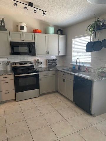 1048 WINDING WATER WAY, Clermont, FL 34714