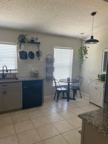 1048 WINDING WATER WAY, Clermont, FL 34714